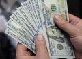 US dollar gains slightly despite softer labour market signals
